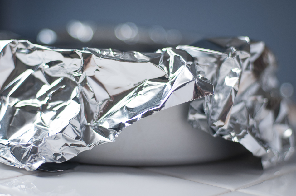 wrap pecan pie cheesecake loosely with aluminum foil