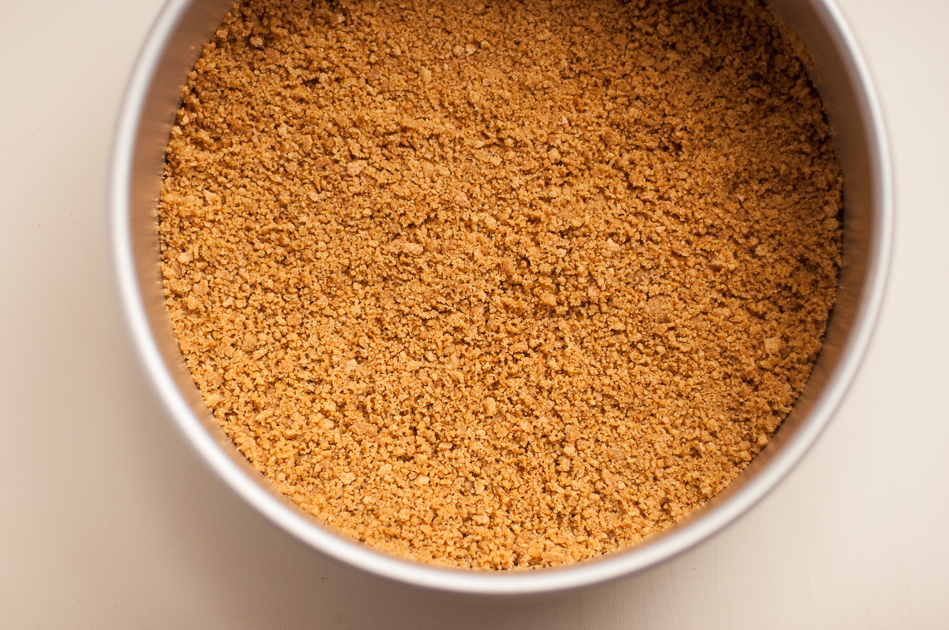 pat graham cracker crumbs gently with backs of fingers